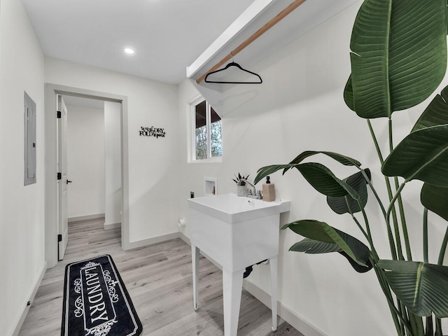 16-2112 Tangerine Dr, Pahoa, HI 96778 - bathroom with electric panel, baseboards, wood finished floors, and recessed lighting