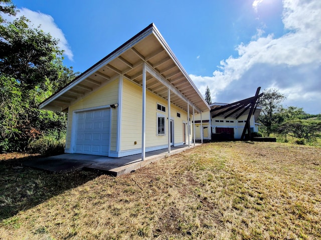 89-1156 Omokaa Pl, Captain Cook, HI 96704 - view of front of property featuring a garage and a front lawn