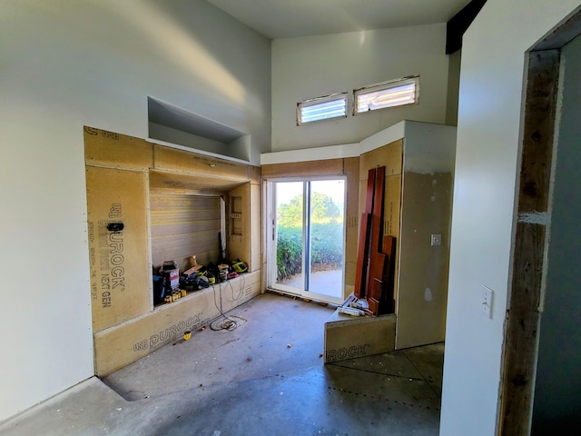89-1156 Omokaa Pl, Captain Cook, HI 96704 - foyer featuring unfinished concrete floors and healthy amount of natural light