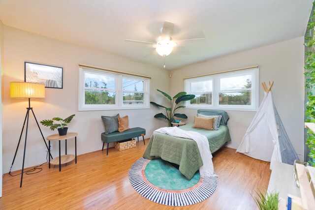 15-1506 23rd Ave, Keaau, HI 96749 - bedroom featuring multiple windows and light wood-type flooring