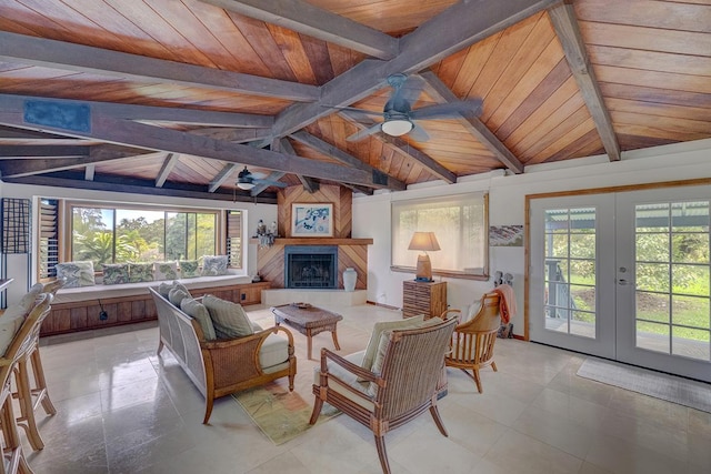 13-125 Nalu Pl, Pahoa, HI 96778 - living area with ceiling fan, wood ceiling, healthy amount of natural light, a large fireplace, and french doors