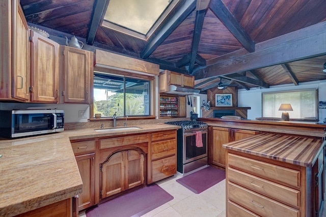 13-125 Nalu Pl, Pahoa, HI 96778 - kitchen featuring stainless steel appliances, a sink, wood ceiling, a peninsula, and under cabinet range hood