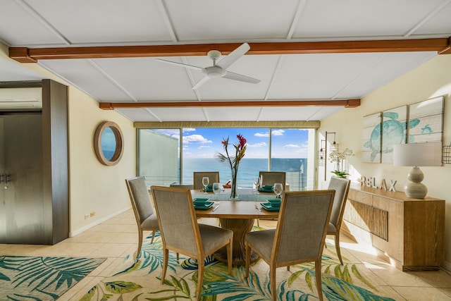 5454 Ka Haku Rd Unit 307, Princeville, HI 96722 - dining space featuring light tile patterned floors, a ceiling fan, baseboards, and a wall mounted AC