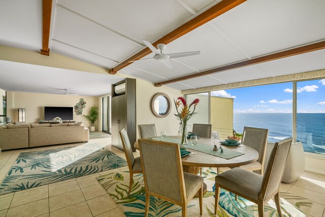 5454 Ka Haku Rd Unit 307, Princeville, HI 96722 - dining room with ceiling fan, light tile patterned flooring, and a water view