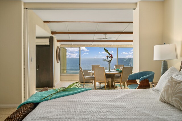 5454 Ka Haku Rd Unit 307, Princeville, HI 96722 - tiled bedroom featuring multiple windows and baseboards