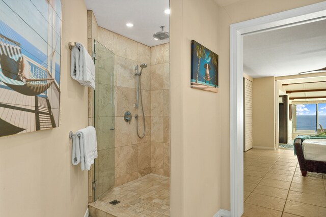 5454 Ka Haku Rd Unit 307, Princeville, HI 96722 - bathroom featuring baseboards, a tile shower, tile patterned floors, and recessed lighting