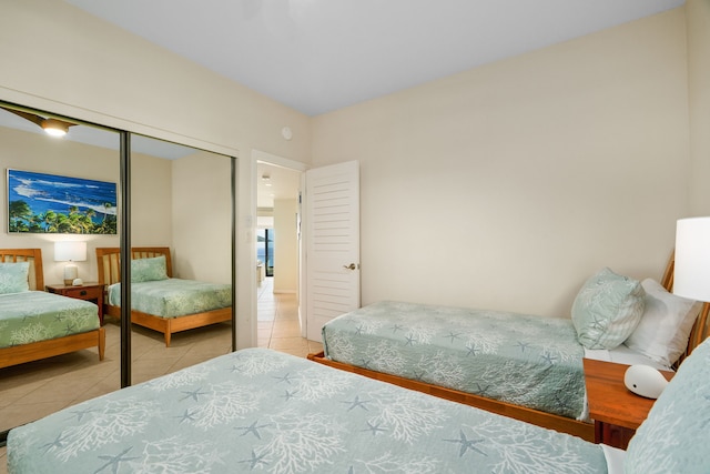 5454 Ka Haku Rd Unit 307, Princeville, HI 96722 - bedroom with tile patterned floors and a closet