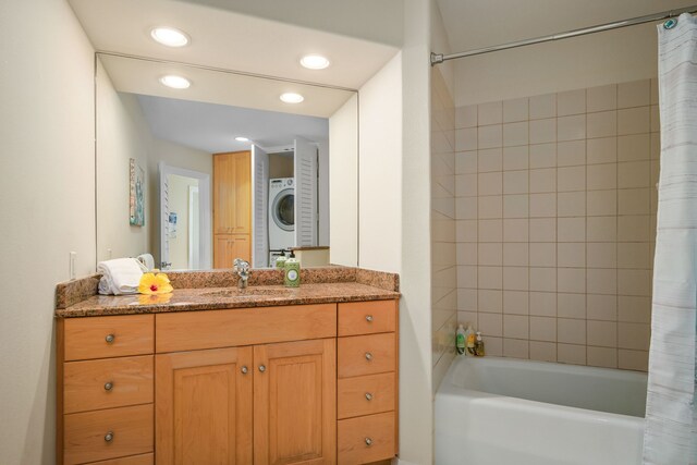 5454 Ka Haku Rd Unit 307, Princeville, HI 96722 - full bath with shower / bath combo with shower curtain, vanity, recessed lighting, and estacked washer and dryer