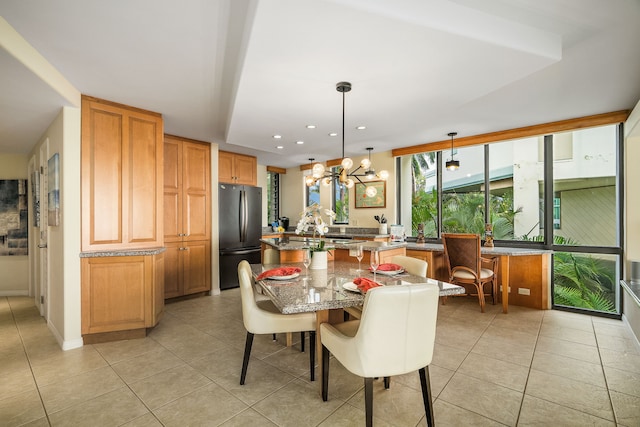 5454 Ka Haku Rd Unit 307, Princeville, HI 96722 - dining room with a chandelier, light tile patterned floors, and recessed lighting