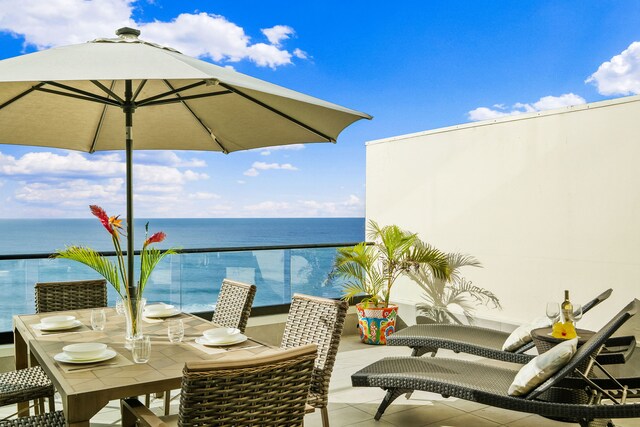 5454 Ka Haku Rd Unit 307, Princeville, HI 96722 - balcony with a water view and outdoor dining area