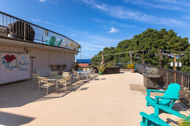 75-5719 Alii Dr Unit 414, Kailua-Kona, HI 96740 - view of patio with grilling area