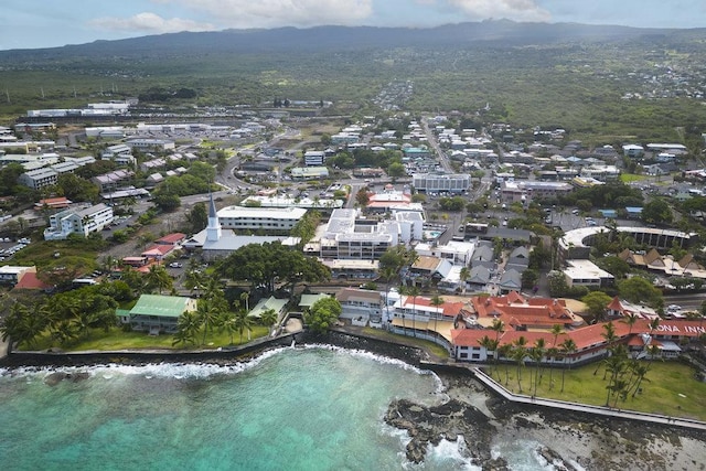 75-5719 Alii Dr Unit 414, Kailua-Kona, HI 96740 - drone / aerial view of a mountain backdrop and a heavily wooded area