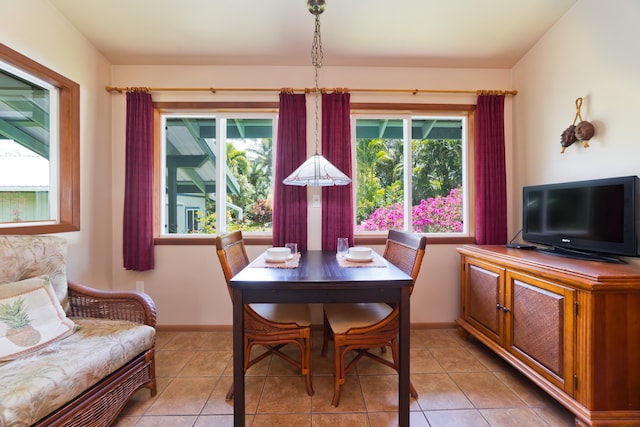 15-2021 11th Ave, Keaau, HI 96749 - dining space featuring light tile patterned flooring and baseboards