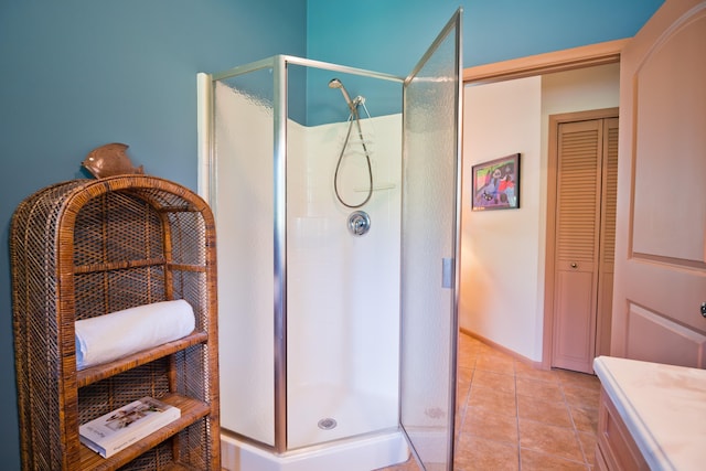 15-2021 11th Ave, Keaau, HI 96749 - bathroom featuring a stall shower, a closet, vanity, and tile patterned flooring