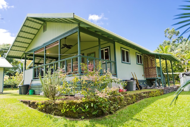 15-2021 11th Ave, Keaau, HI 96749 - view of property exterior with ceiling fan and a yard