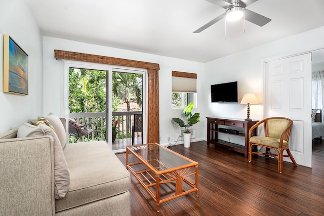 76-134 Heenalu Rd Unit 10, Kailua-Kona, HI 96740 - living area with dark wood finished floors, a ceiling fan, and baseboards