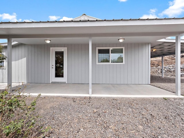 92-8215 Bamboo Ln, Ocean View, HI 96737 - view of exterior entry with a patio