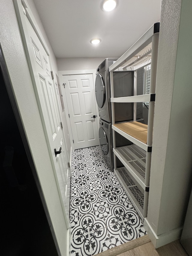 16-2062 Paradise Dr, Pahoa, HI 96778 - laundry room featuring stacked washer / dryer and recessed lighting