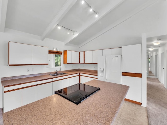 907 Mala Pua Way, Hilo, HI 96720 - kitchen featuring white refrigerator with ice dispenser, rail lighting, white cabinets, a sink, and light tile patterned floors