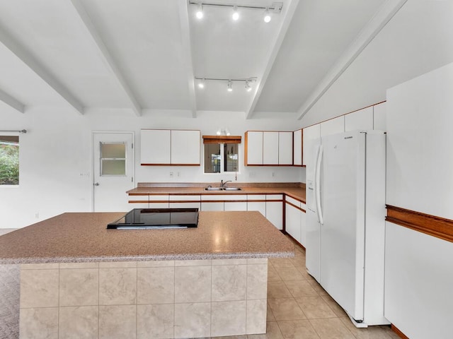 907 Mala Pua Way, Hilo, HI 96720 - kitchen with white refrigerator with ice dispenser, track lighting, a sink, a center island, and beam ceiling