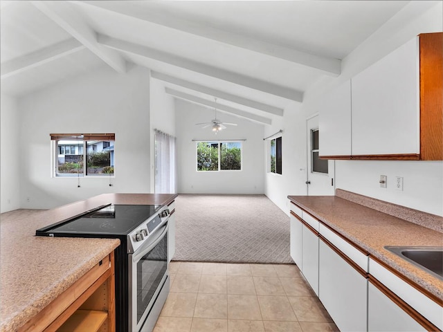 907 Mala Pua Way, Hilo, HI 96720 - kitchen with stainless steel range with electric cooktop, light colored carpet, white cabinets, light tile patterned floors, and a ceiling fan