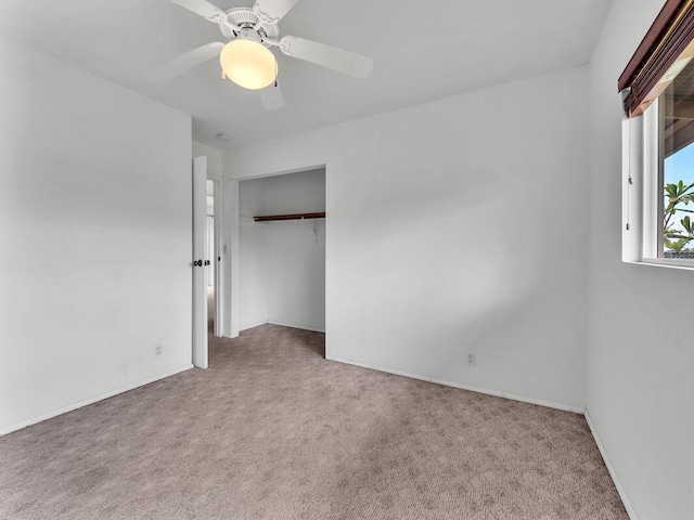 907 Mala Pua Way, Hilo, HI 96720 - unfurnished bedroom featuring carpet floors, a closet, a ceiling fan, and baseboards