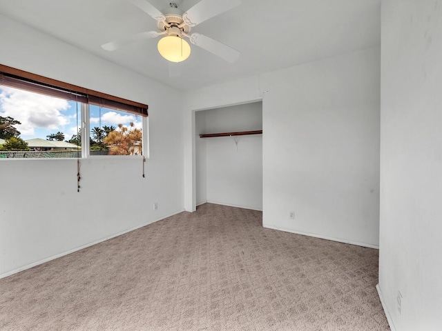 907 Mala Pua Way, Hilo, HI 96720 - unfurnished bedroom with carpet flooring, a closet, a ceiling fan, and baseboards
