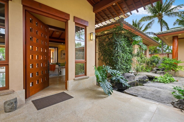 68-108 Pukaua Pl, Kamuela, HI 96743 - view of exterior entry featuring stucco siding