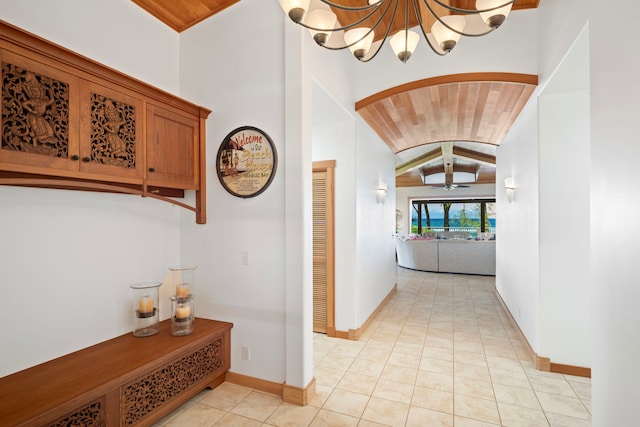 7312 Alealea Rd, Hanalei, HI 96722 - corridor featuring vaulted ceiling, arched walkways, wood ceiling, baseboards, and light tile patterned floors