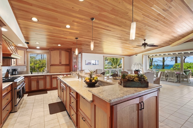 7312 Alealea Rd, Hanalei, HI 96722 - kitchen with high end stainless steel range, light tile patterned floors, a kitchen island with sink, premium range hood, and wooden ceiling