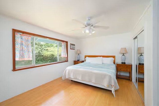 15-1893 32nd Ave, Keaau, HI 96749 - bedroom featuring light wood-style flooring, a closet, and ceiling fan