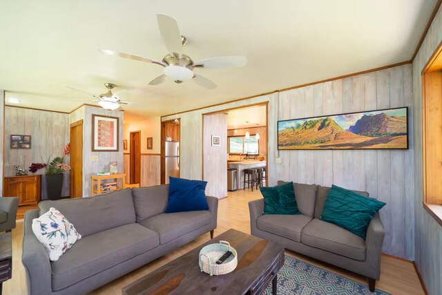 15-1893 32nd Ave, Keaau, HI 96749 - living area with wooden walls, a ceiling fan, and wood finished floors