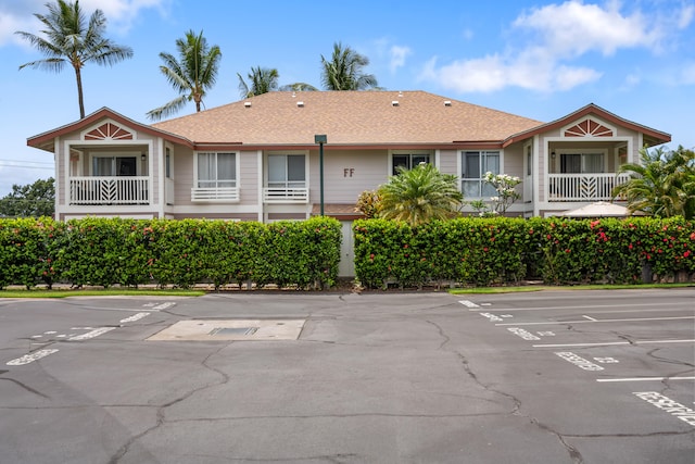 75-6081 Alii Dr Unit Ff102, Kailua-Kona, HI 96740 - view of building exterior featuring uncovered parking