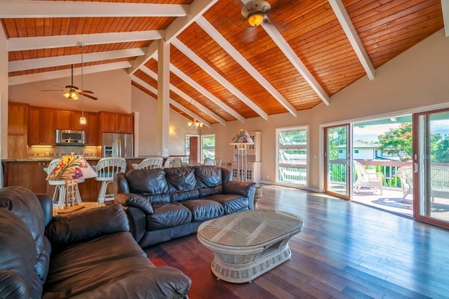 3636 Keoniana Rd, Princeville, HI 96722 - living room with high vaulted ceiling, wood finished floors, ceiling fan, and wood ceiling with exposed beams