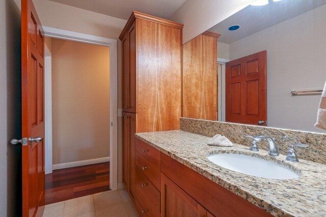 3636 Keoniana Rd, Princeville, HI 96722 - bathroom featuring vanity, tile patterned floors, and baseboards