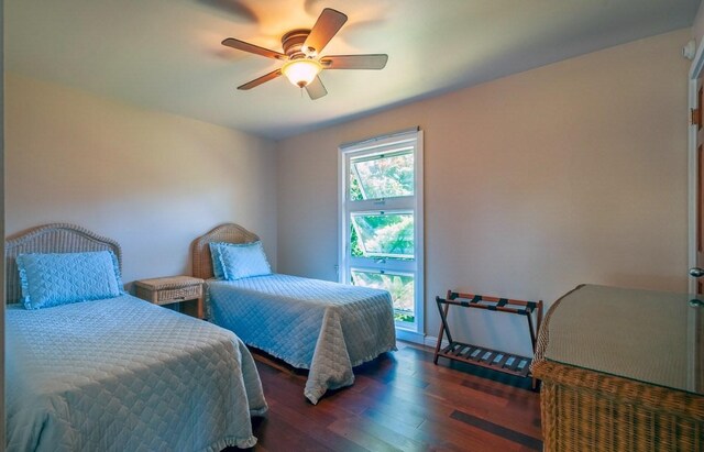 3636 Keoniana Rd, Princeville, HI 96722 - bedroom featuring wood finished floors, a ceiling fan, and baseboards