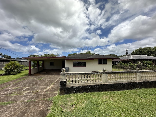 5684 Wailaau Rd, Koloa, HI 96756 - rear view of property with a carport and concrete driveway