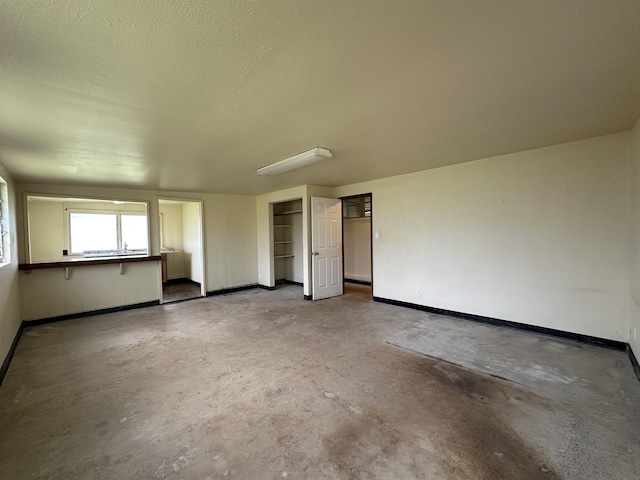 5684 Wailaau Rd, Koloa, HI 96756 - spare room with concrete flooring and baseboards