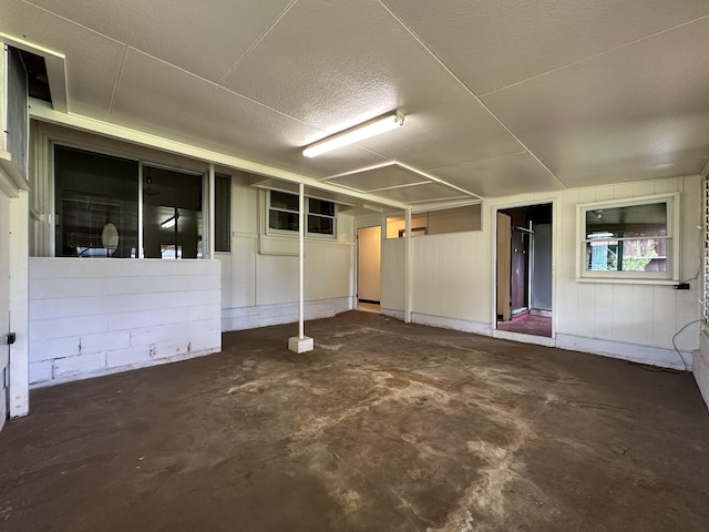 5684 Wailaau Rd, Koloa, HI 96756 - interior space featuring concrete floors and a textured ceiling