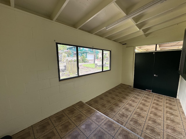 5684 Wailaau Rd, Koloa, HI 96756 - unfurnished bedroom featuring concrete block wall