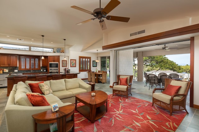68-1025 Kaniku Dr Unit 612, Kamuela, HI 96743 - living area with a ceiling fan and high vaulted ceiling