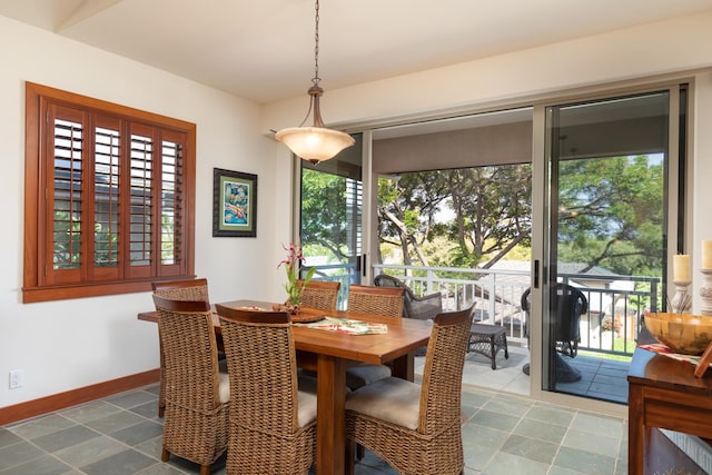 68-1025 Kaniku Dr Unit 612, Kamuela, HI 96743 - dining area with healthy amount of natural light and baseboards
