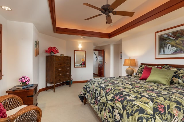 68-1025 Kaniku Dr Unit 612, Kamuela, HI 96743 - carpeted bedroom with a tray ceiling, baseboards, and a ceiling fan
