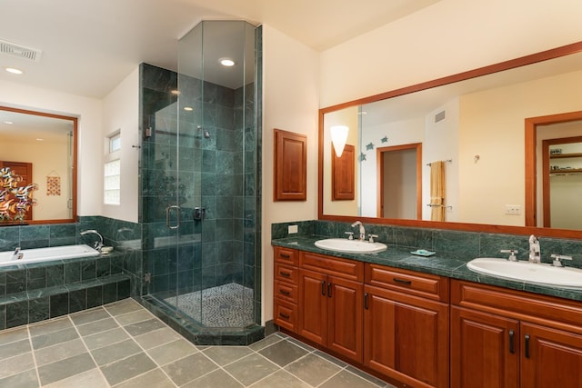 68-1025 Kaniku Dr Unit 612, Kamuela, HI 96743 - bathroom featuring a stall shower, double vanity, tile patterned floors, and a garden tub