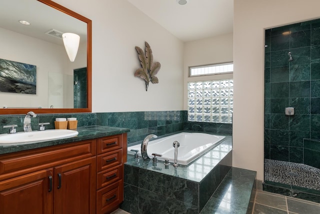68-1025 Kaniku Dr Unit 612, Kamuela, HI 96743 - full bathroom with a garden tub, vanity, tiled shower, and recessed lighting