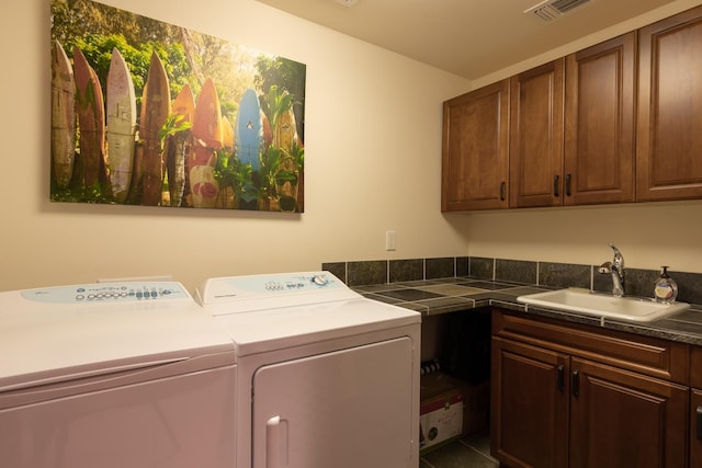 68-1025 Kaniku Dr Unit 612, Kamuela, HI 96743 - laundry area featuring washing machine and dryer and cabinet space