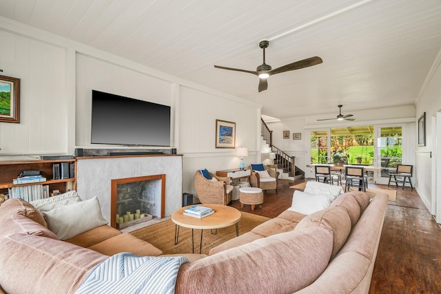 2819 Kapena St, Lihue, HI 96766 - living room featuring ornamental molding, ceiling fan, stairs, wood finished floors, and a high end fireplace