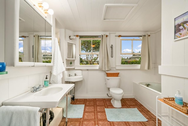 2819 Kapena St, Lihue, HI 96766 - full bathroom featuring toilet, a bath, vanity, and tile patterned floors