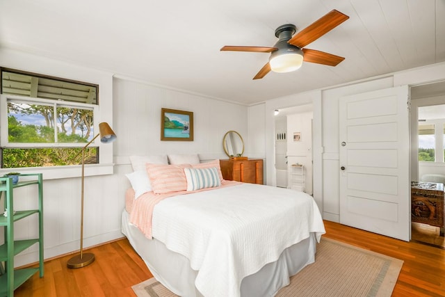 2819 Kapena St, Lihue, HI 96766 - bedroom with wood finished floors, ornamental molding, and a ceiling fan
