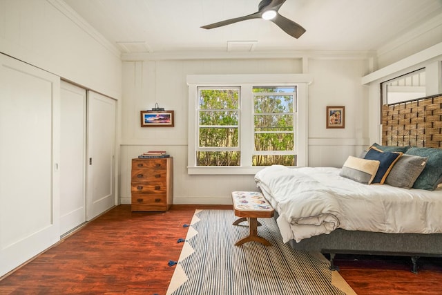 2819 Kapena St, Lihue, HI 96766 - bedroom featuring crown molding, a decorative wall, wood finished floors, and a ceiling fan